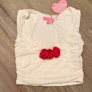 White Top with Red Floral Accents